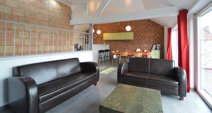 A Cosy Vintage Loft to Discover, Ideal for Exploring the Region by Bike