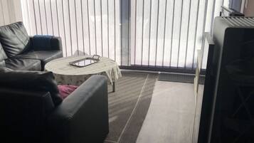 Ferienhaus | Wohnbereich | Kamin