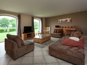 Villa | Woonkamer | Een dvd-speler