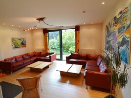 Villa | Living area | TV, fireplace, DVD player