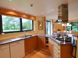 Villa | Private kitchen | Fridge, microwave, stovetop, dishwasher