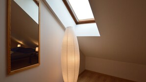 A room with a skylight, a large mirror, and a textured light fixture. - Nice Holiday Farmhouse Located in Sourbrodt near Ski Resort of Ovifat (Waimes)