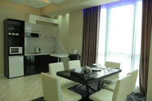 Deluxe Apartment | In-room dining - Apart Hotel Suzani (Dushanbe)