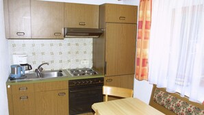Apartment | Private kitchen - Charming Apartment in Faggen Near Sarfaus Ski Area (Faggen)