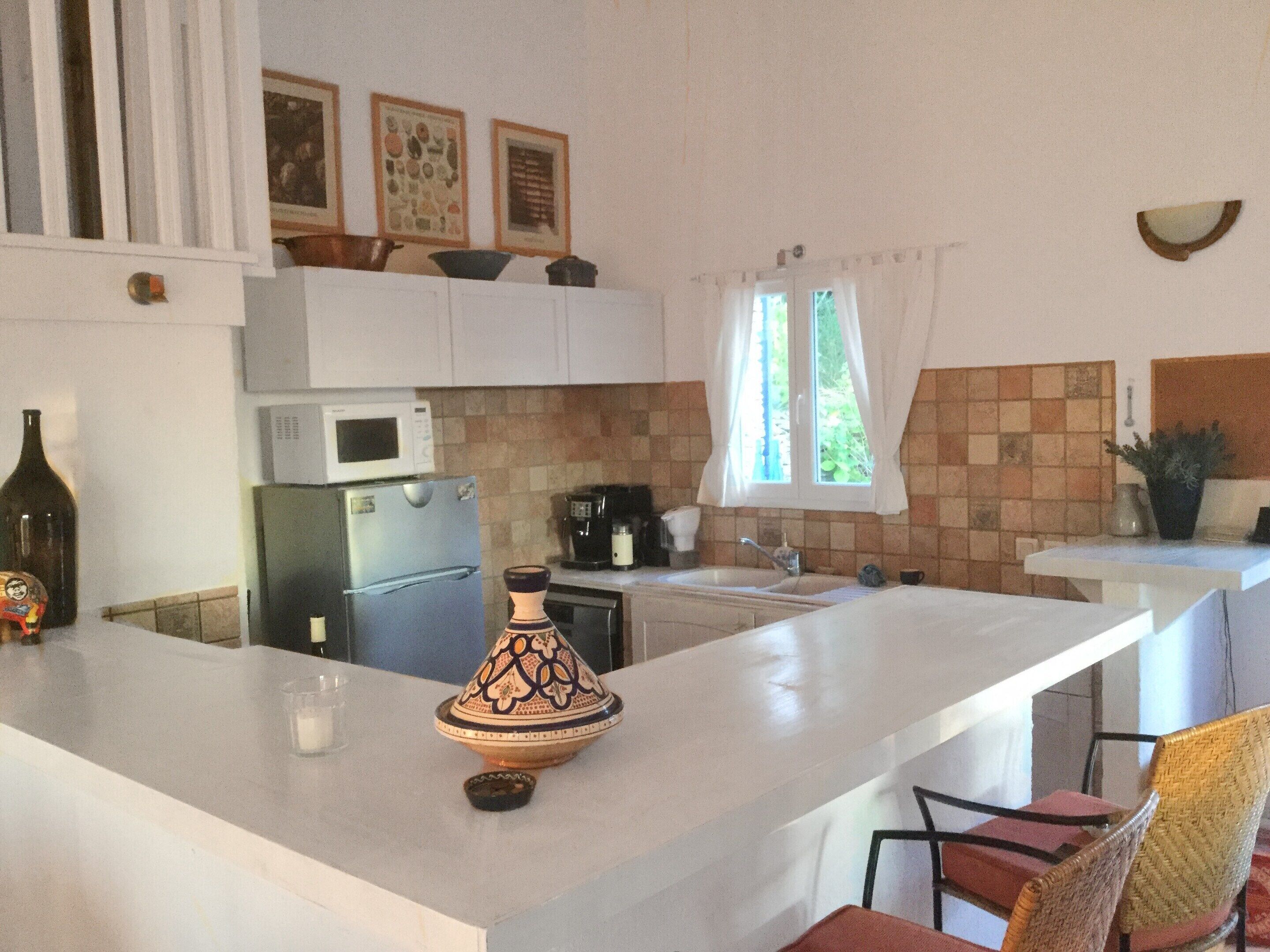 Villa | Private kitchen | Stovetop, high chair