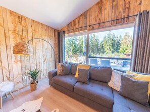 Chalet | Woonkamer | Een open haard