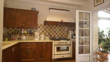 Villa | Private kitchen | Fridge, microwave, oven, dishwasher