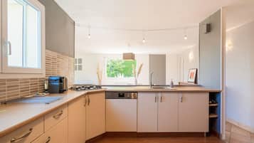 Villa | Private kitchen | Fridge, oven, high chair