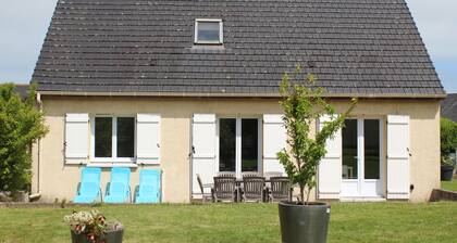 Sleek, Modern and Spacious Villa With the Invasion Beaches in the Back Garden