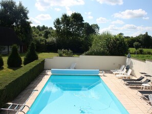 Outdoor pool, a heated pool - Gorgeous Norman Half-timbered House With Heated Swimming Pool, Sauna, Bar, Billiards (Saint-Etienne-l'Allier)