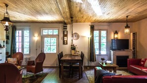 House | Living room | Fireplace, DVD player - Cozy Holiday Home With Private Garden in Savignac-lédrier (Savignac-Ledrier)