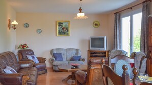 Villa | Woonkamer | Een dvd-speler