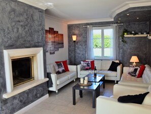 Ferienhaus | Wohnzimmer | Kamin