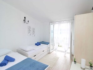Apart Daire | 3 yatak odası, ayrı ayrı döşenmiş, çarşaf takımı