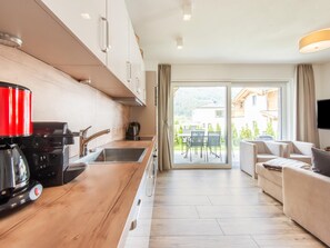 House | Private kitchen | Microwave, coffee/tea maker, highchair - Holiday Home in Niedernsill With Sauna (Niedernsill)