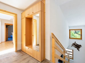 Enjoy a peaceful retreat with a view of lush greenery from the window.