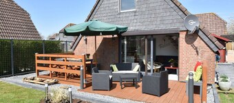 Snug Holiday Home in Herkingen with Hot Tub in Garden