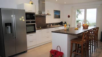 Villa | Private kitchen | Fridge, stovetop