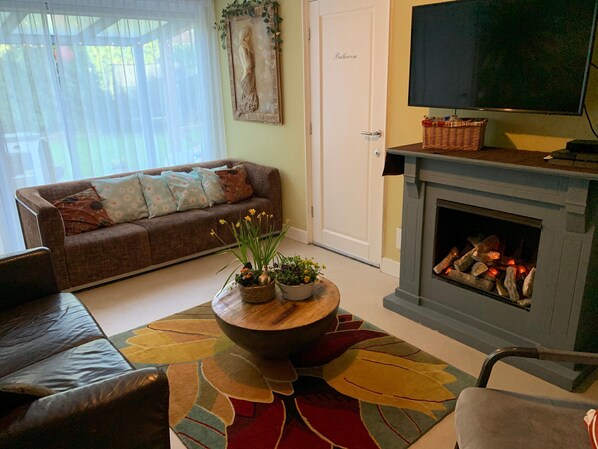 Villa | Living room | Fireplace - Exotic Villa in Den Ham with Sauna near City Center (Den Ham)