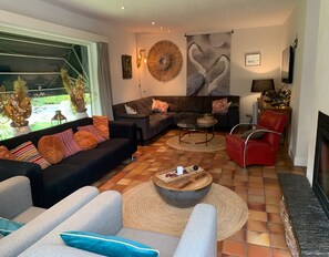 Villa | Living room | Fireplace - Exotic Villa in Den Ham with Sauna near City Center (Den Ham)