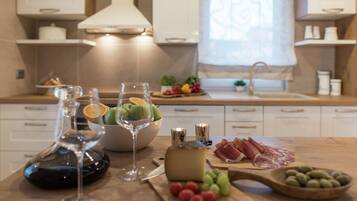 Villa | Private kitchen | Microwave, highchair