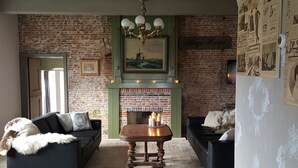 Ferienhaus | Wohnzimmer | Kamin