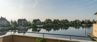 Exclusive Holiday Home Floating on a Lake in Friesland