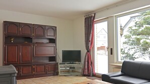 House | Living room | DVD player - Charming Holiday Home in Immerath Eifel Near Ski Area (Winterberg)