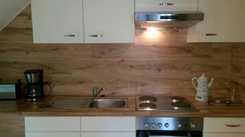 Apartamento | Cozinha privada | Cadeirão de bebê