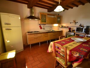 Villa | Private kitchen | Toaster, high chair - Belvilla by OYO Villa dei Tarocchi (Pistoia)