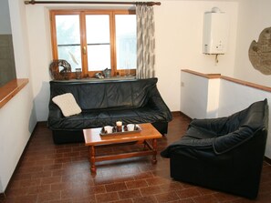 Ferienhaus | Wohnzimmer | Kamin