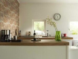 House | Private kitchen | Stovetop, electric kettle, highchair - Serene Holiday Home in Haaksbergen With Hottub (Haaksbergen)