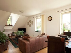 Apartment | Living room | DVD player, MP3 dock - Delightful Apartment in Tholen With Roof Terrace (Tholen)