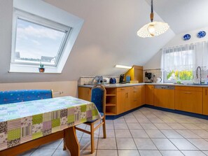 Appartement | Cuisine privée | Chaise haute