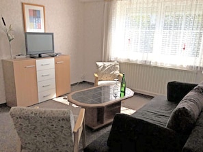 Apartamento | Área de estar | TV