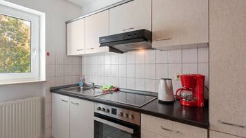 Apartemen | Dapur pribadi | Kursi makan untuk bayi