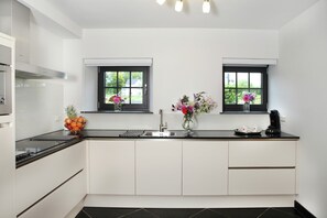 House | Private kitchen | Microwave, coffee/tea maker, highchair - Holiday Home in Epen With Garden & BBQ (Epen)