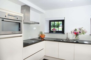 House | Private kitchen | Microwave, coffee/tea maker, highchair - Holiday Home in Epen With Garden & BBQ (Epen)