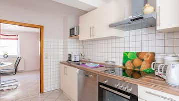 Apartamento | Cocina privada | Trona infantil