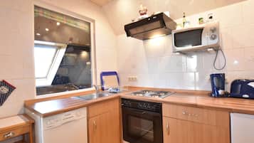 Apartamento | Cocina privada | Trona infantil