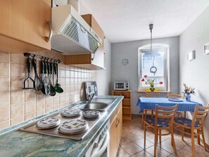 Appartement | Cuisine privée | Chaise haute