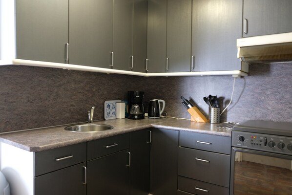 Fridge, microwave, high chair