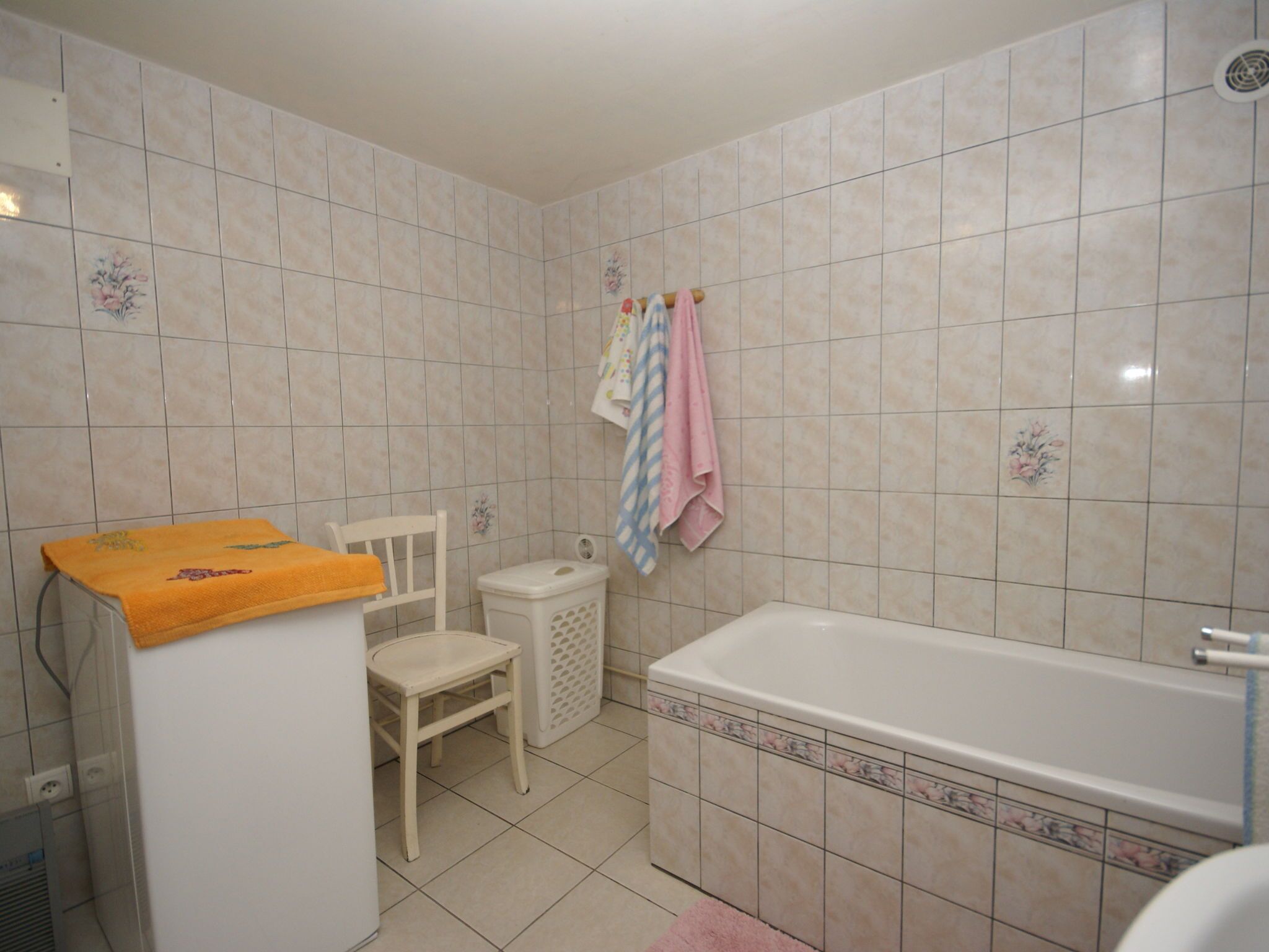 Rumah | Kamar mandi | Bathtub dan handuk