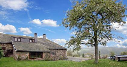 Farmhouse Situated at the Edge of the Woods