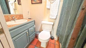 Bathtub, hair dryer, towels