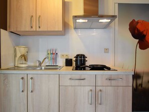 Apartment | Private kitchen | Microwave, highchair