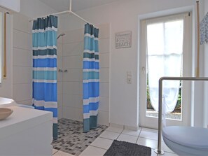 Bathroom | Shower, hair dryer, towels