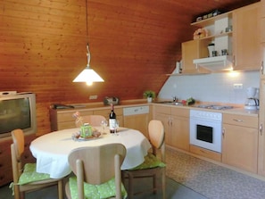 Apartment | Private kitchen | Microwave, stovetop, highchair, cookware/dishes/utensils