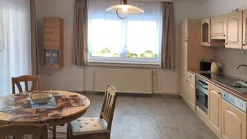 Apartment | Private kitchen | Toaster, high chair