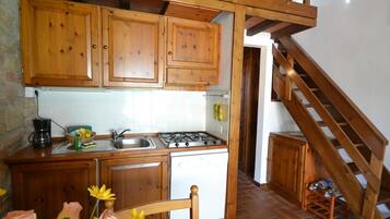 Apartment | Private kitchen | Stovetop, high chair